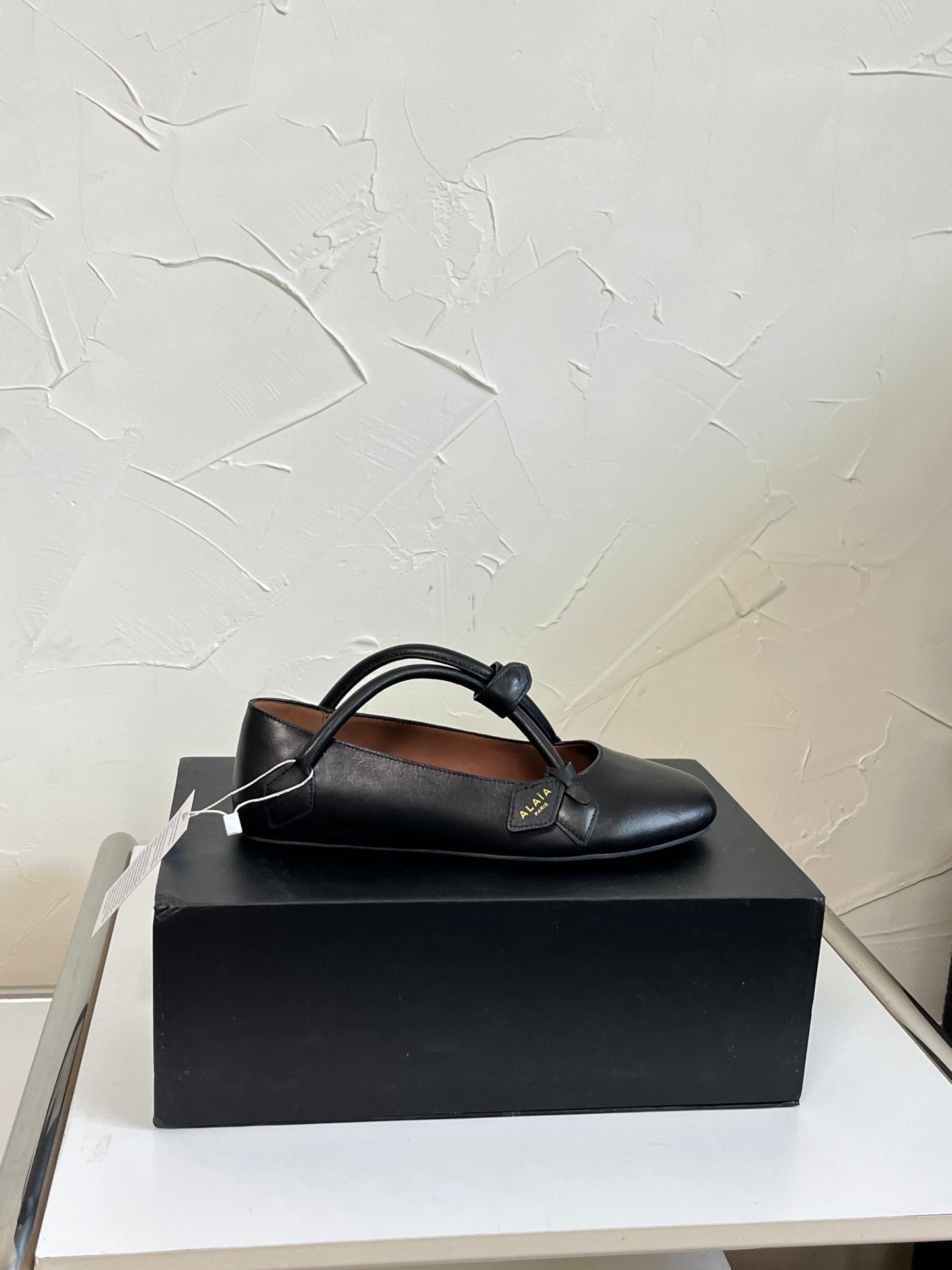 ALAÏA Ballet Flats with Cross-Strap