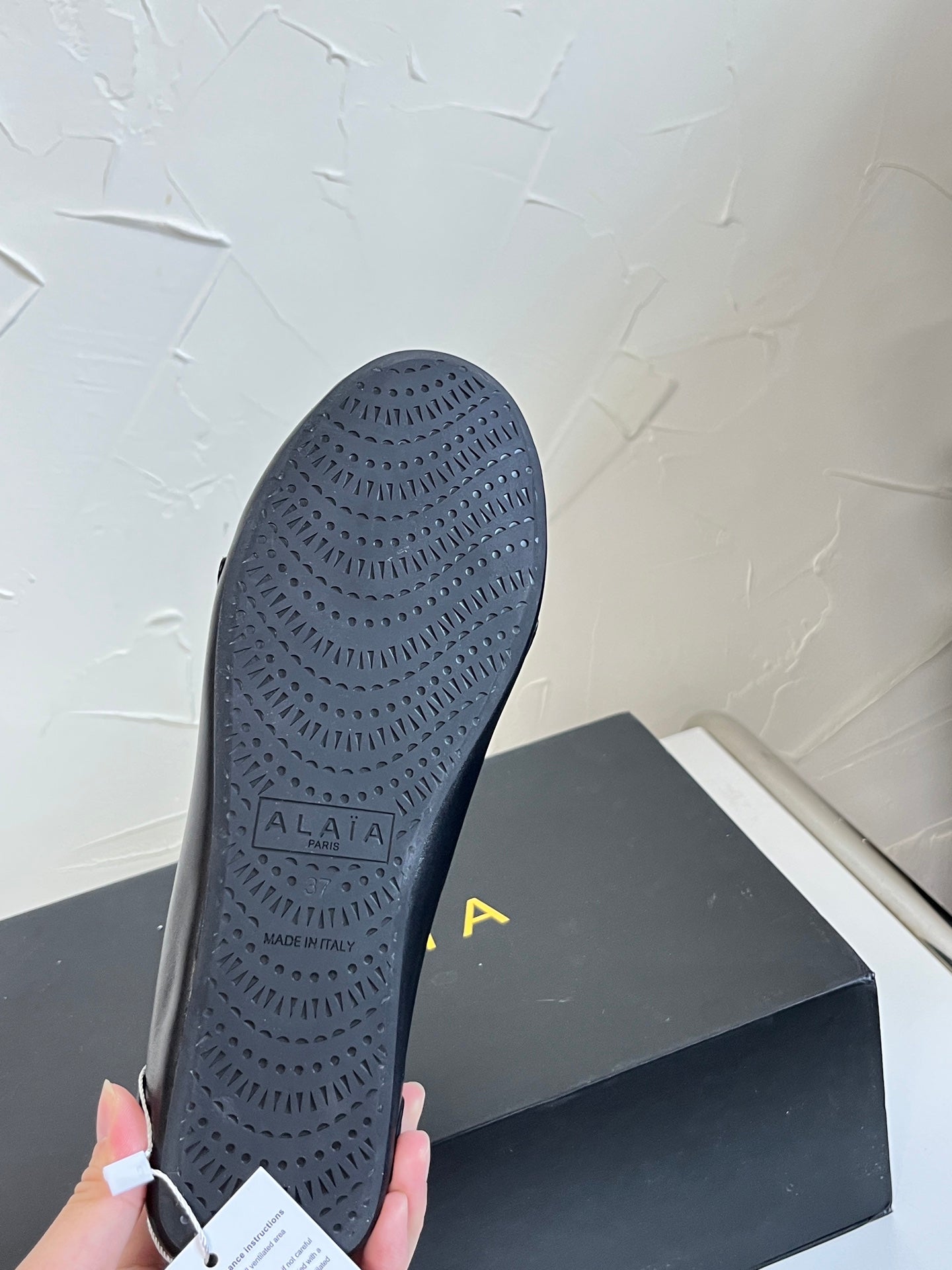 ALAÏA Ballet Flats with Cross-Strap