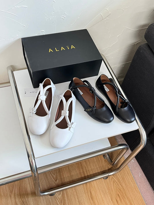 ALAÏA Ballet Flats with Cross-Strap