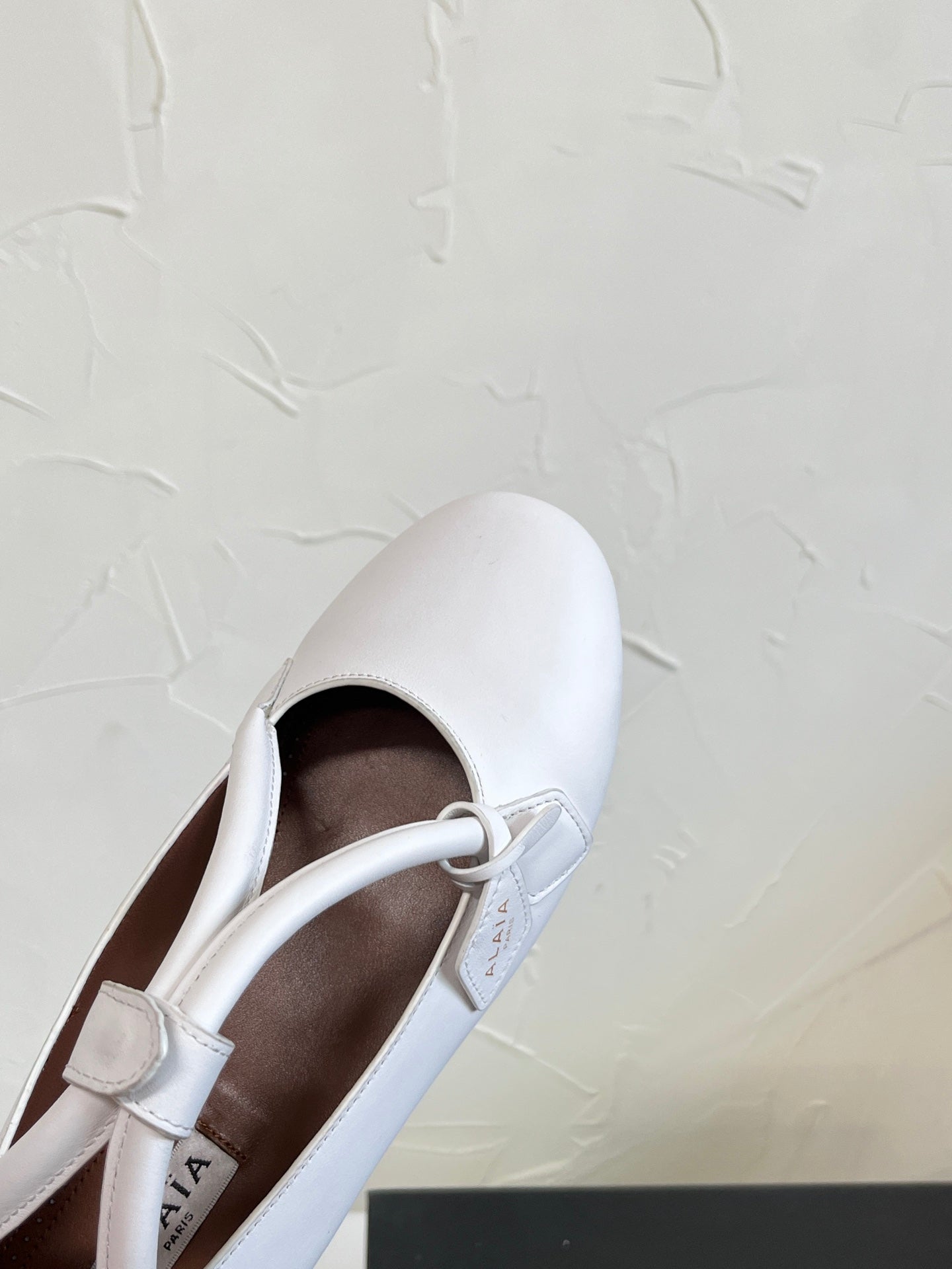 ALAÏA Ballet Flats with Cross-Strap