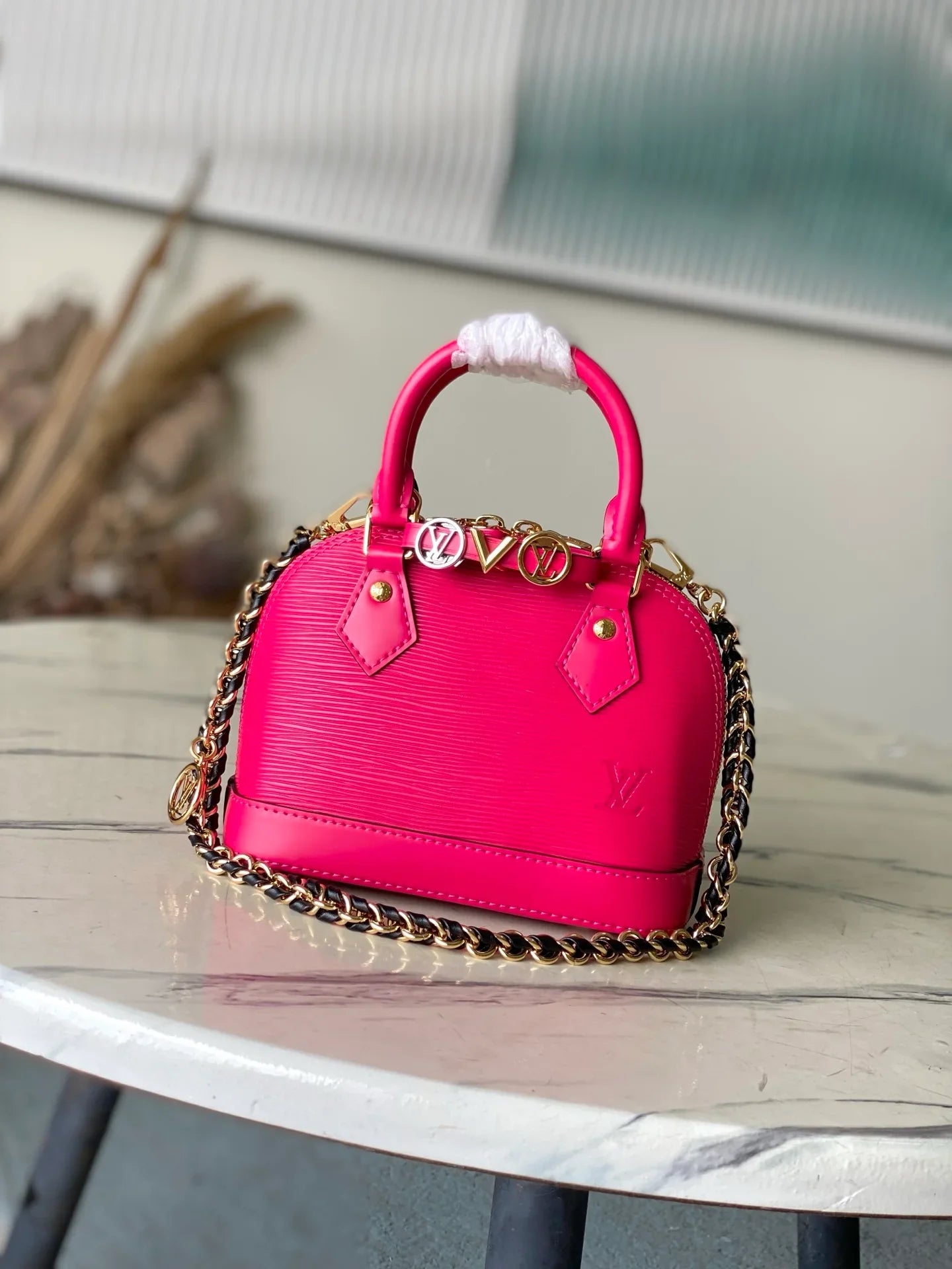 Louis Vuitton Alma BB in Epi Leather