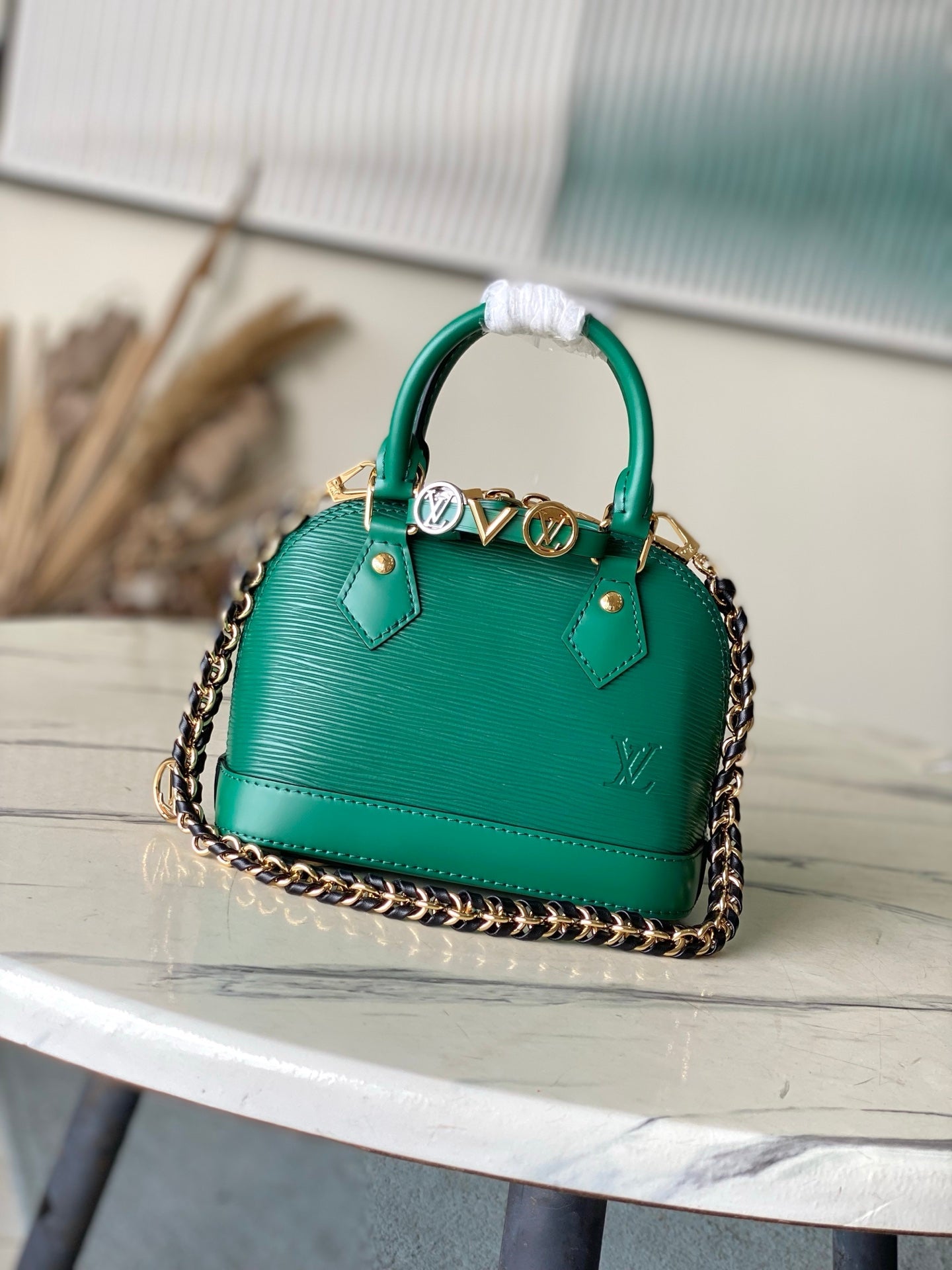 Louis Vuitton Alma BB in Epi Leather