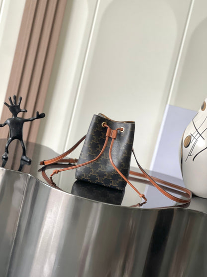 Celine Mini Bucket Bag in Triomphe Canvas