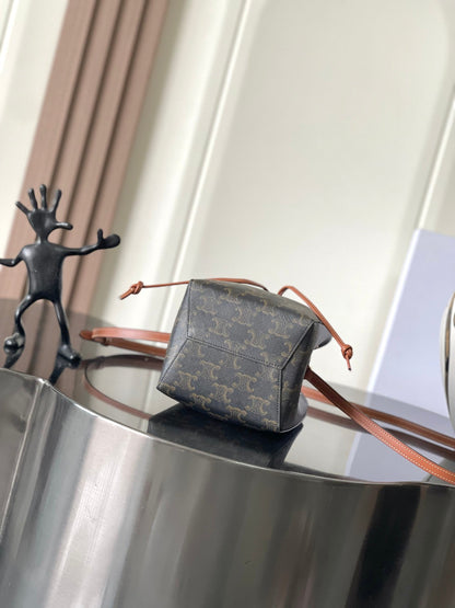 Celine Mini Bucket Bag in Triomphe Canvas