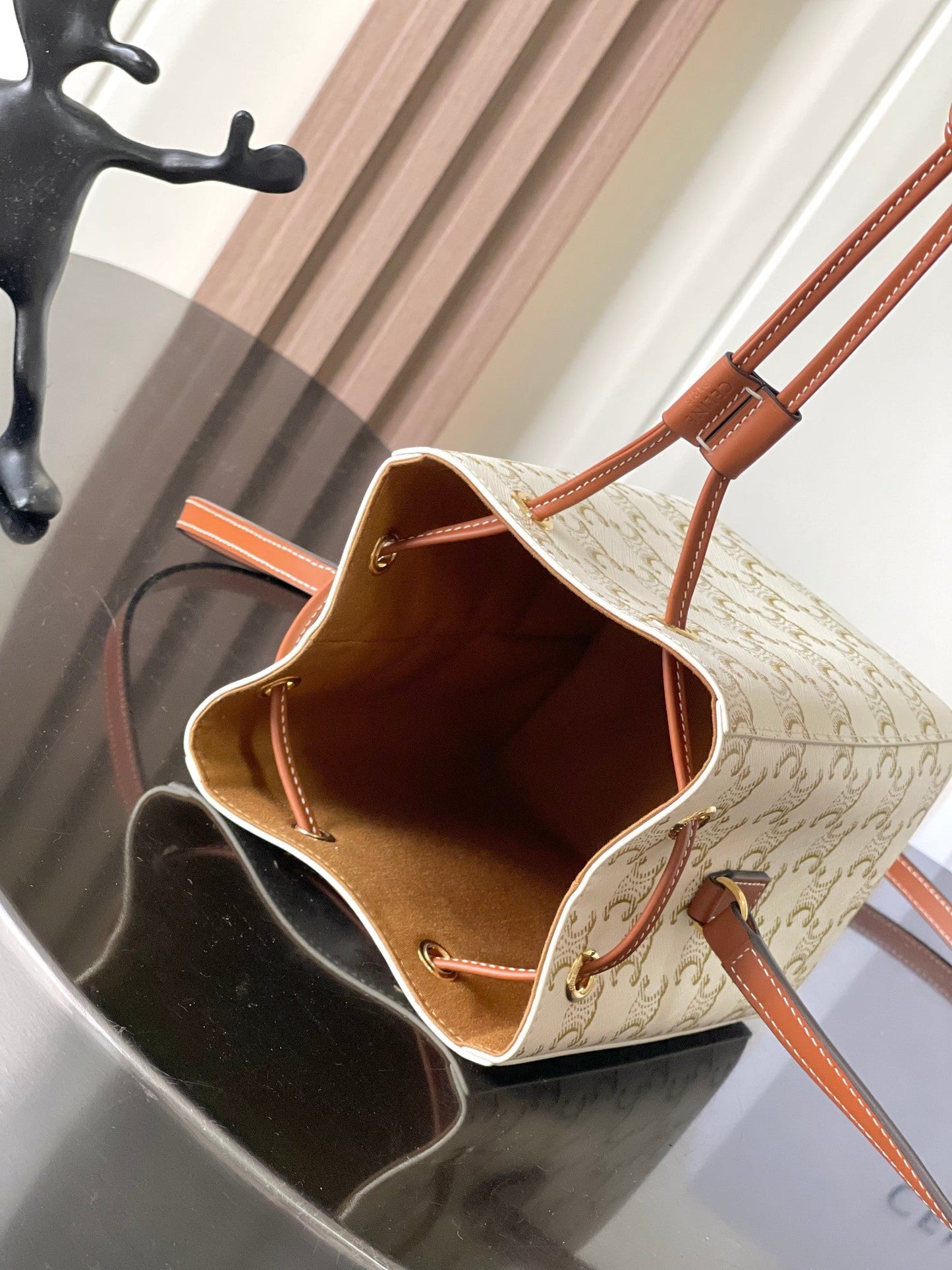 Celine Mini Bucket Bag in Triomphe Canvas
