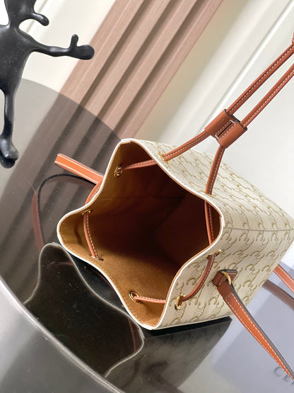 Celine Mini Bucket Bag in Triomphe Canvas