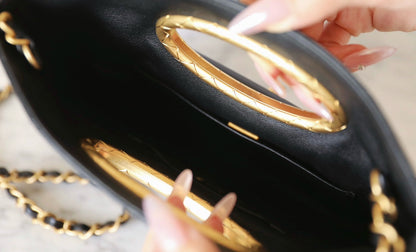 Chanel 24B Lambskin Clutch with Chain – Black
