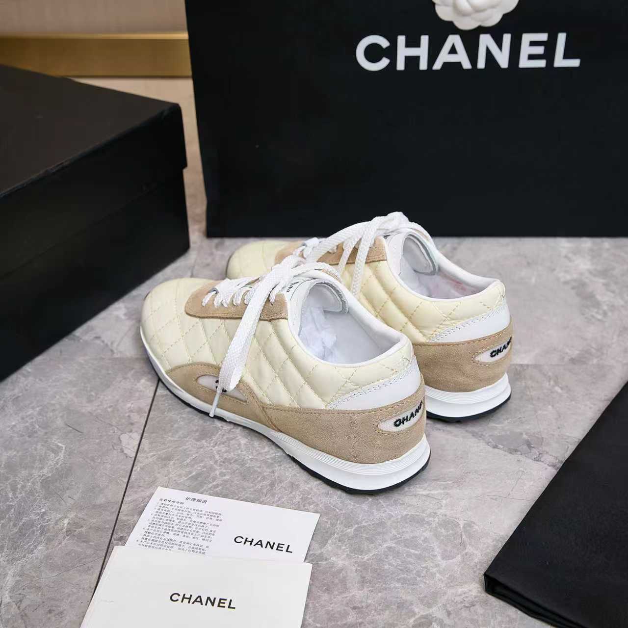 Chanel Quilted Calfskin & Suede Lace-Up Sneakers