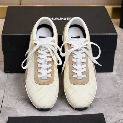Chanel Quilted Calfskin & Suede Lace-Up Sneakers