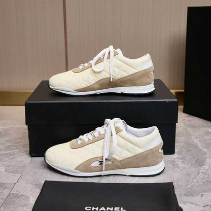 Chanel Quilted Calfskin & Suede Lace-Up Sneakers