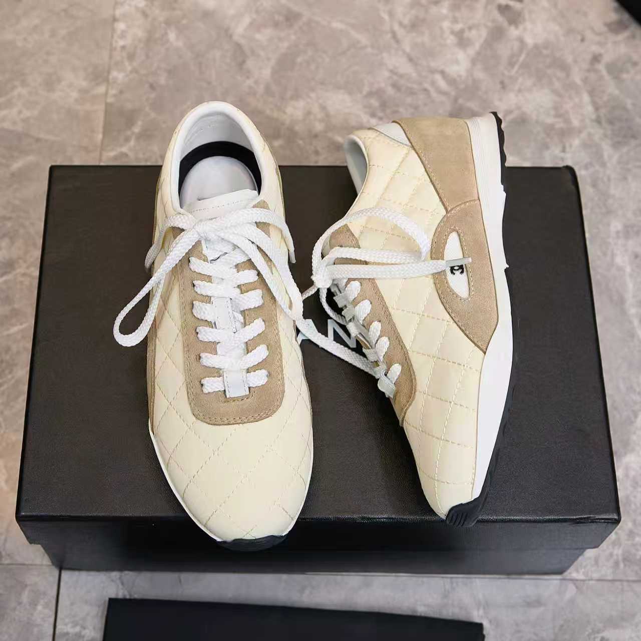 Chanel Quilted Calfskin & Suede Lace-Up Sneakers