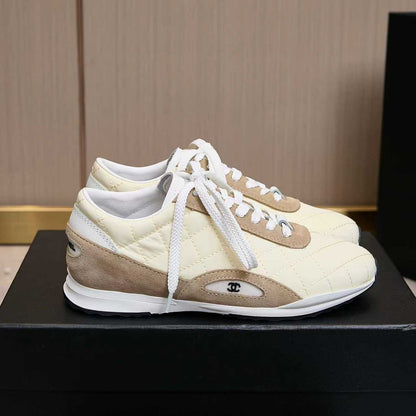 Chanel Quilted Calfskin & Suede Lace-Up Sneakers
