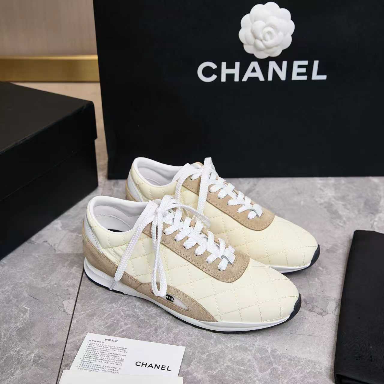 Chanel Quilted Calfskin & Suede Lace-Up Sneakers