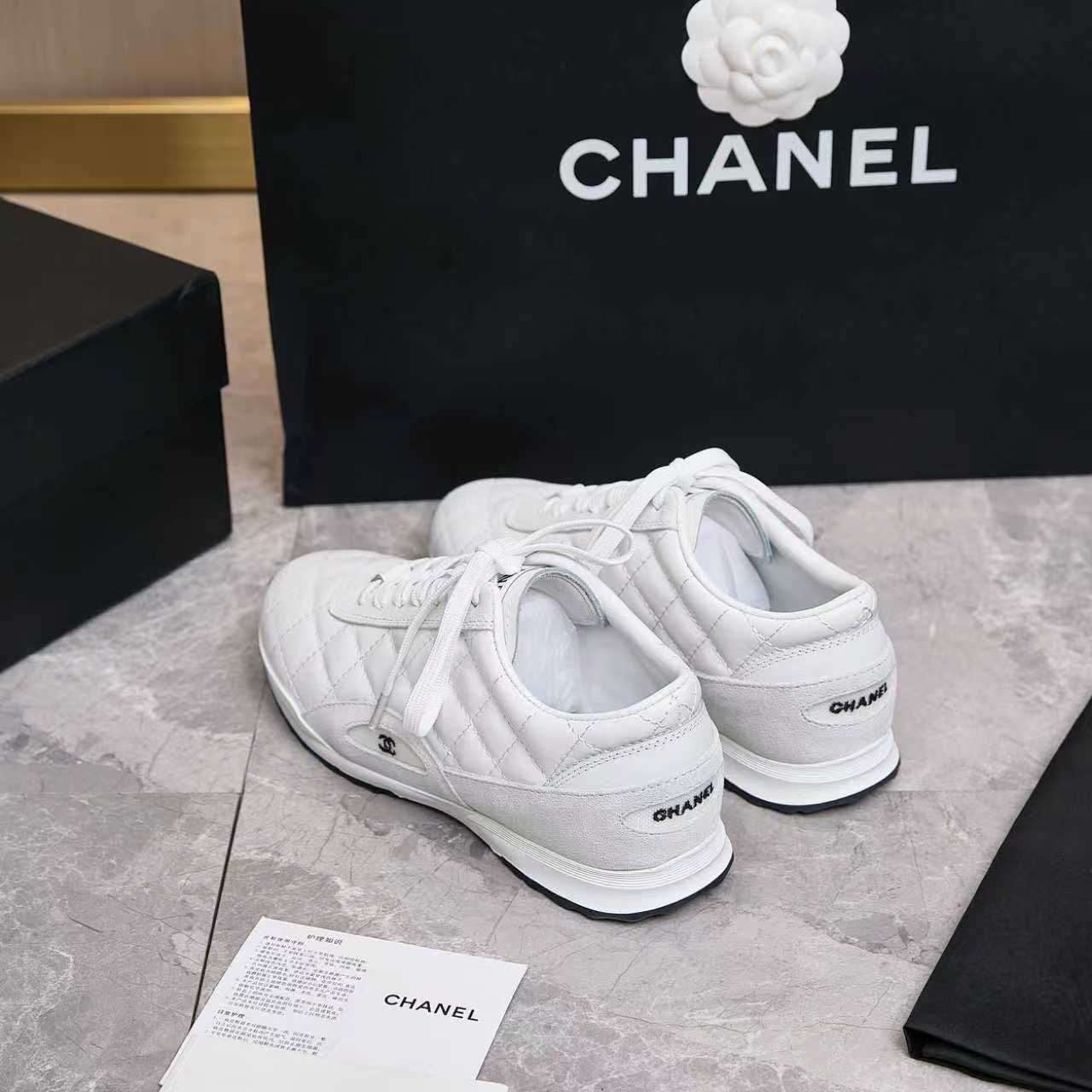 Chanel Quilted Calfskin & Suede Lace-Up Sneakers
