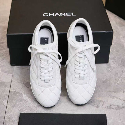 Chanel Quilted Calfskin & Suede Lace-Up Sneakers