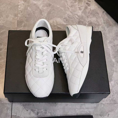 Chanel Quilted Calfskin & Suede Lace-Up Sneakers