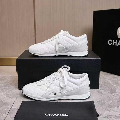 Chanel Quilted Calfskin & Suede Lace-Up Sneakers