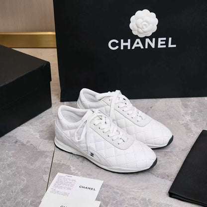 Chanel Quilted Calfskin & Suede Lace-Up Sneakers