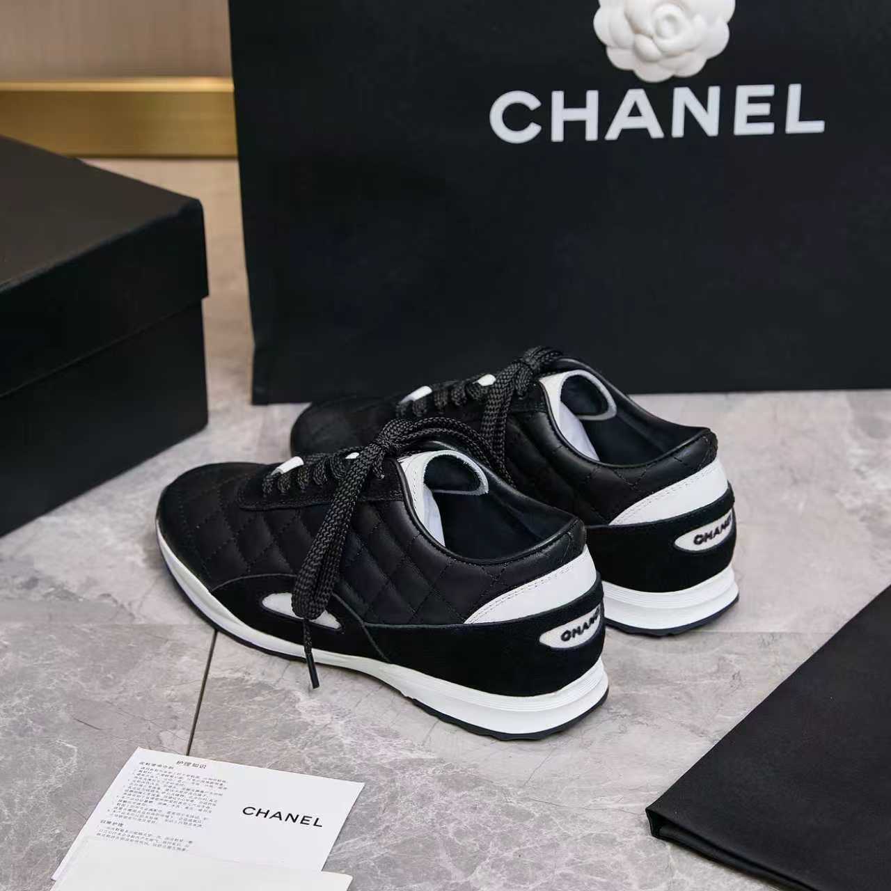 Chanel Quilted Calfskin & Suede Lace-Up Sneakers