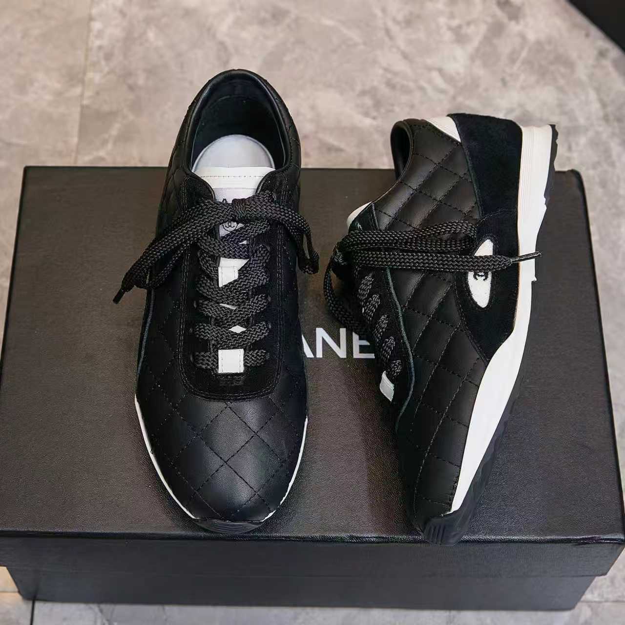 Chanel Quilted Calfskin & Suede Lace-Up Sneakers
