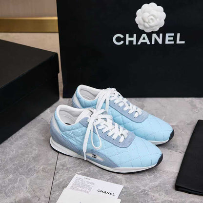 Chanel Quilted Calfskin & Suede Lace-Up Sneakers