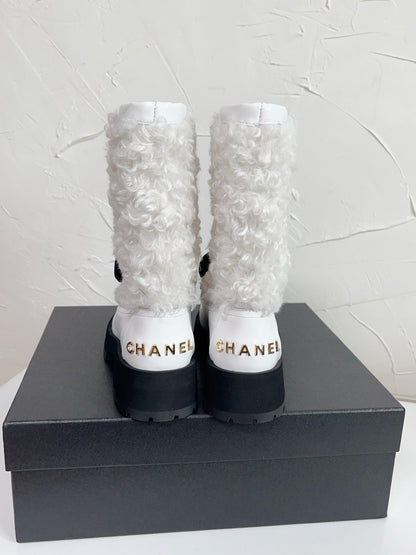 Chanel Shearling Bow Snow Boots
