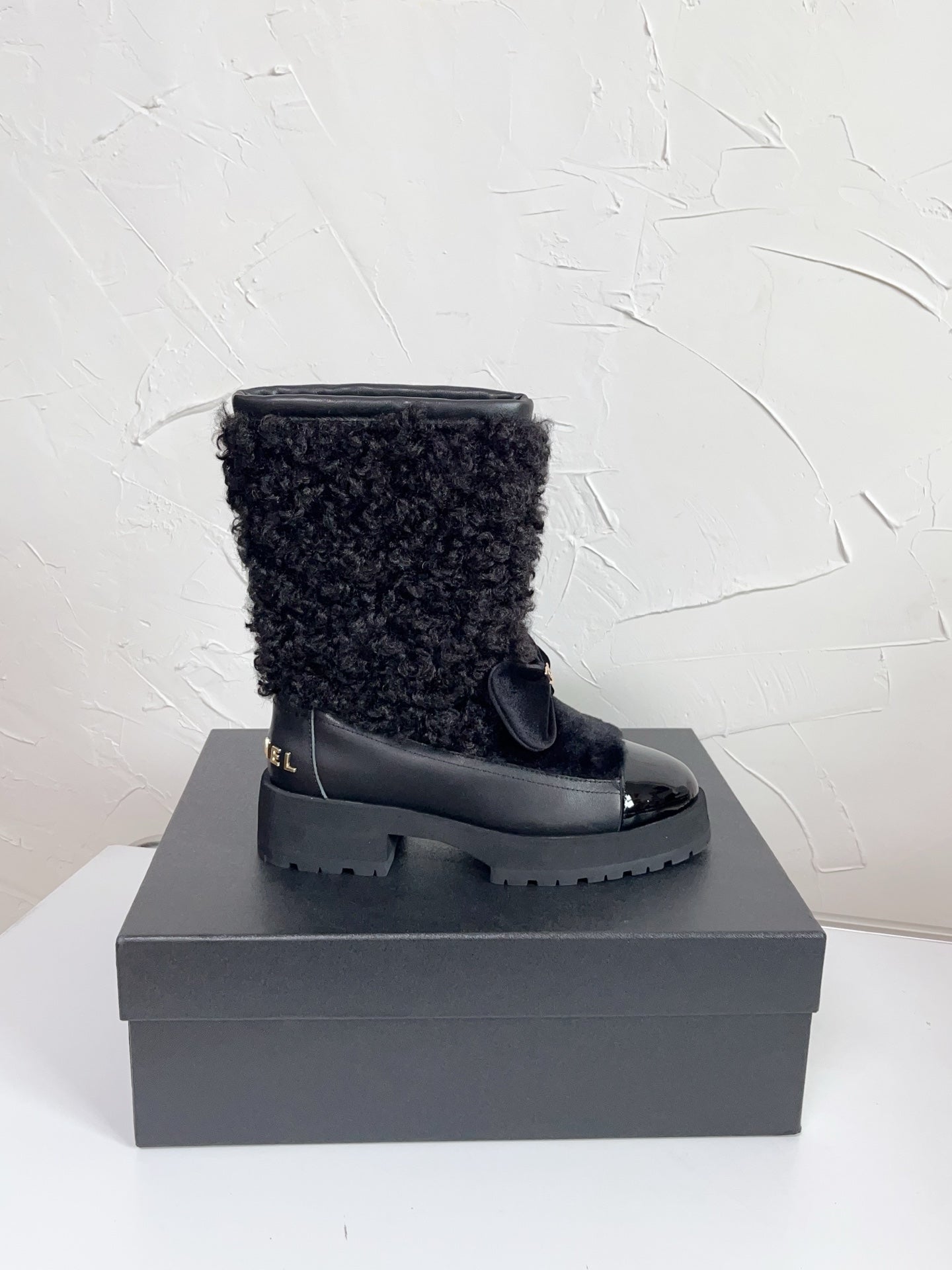 Chanel Shearling Bow Snow Boots