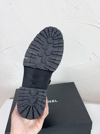 Chanel Shearling Bow Snow Boots