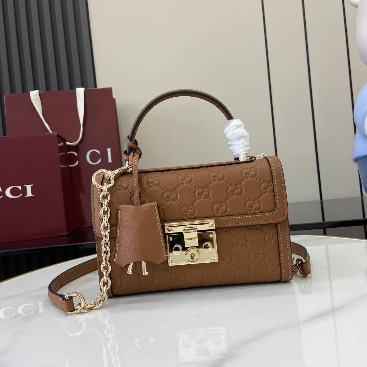 Gucci Padlock GG Embossed Mini Top Handle Bag
