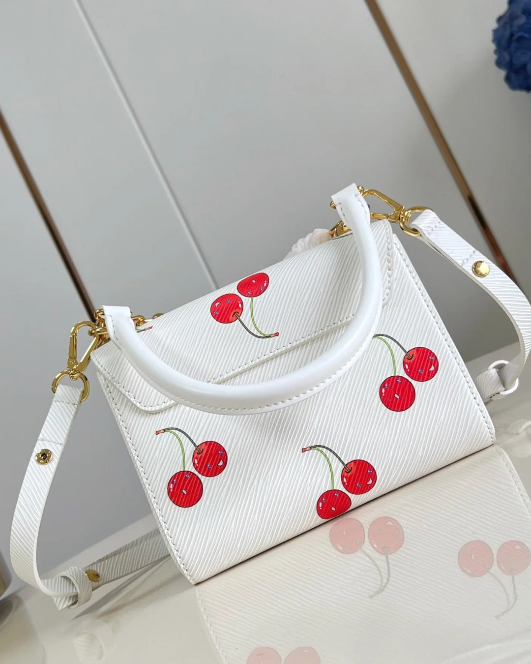 LV x TM Twist MM Epi Leather Bag