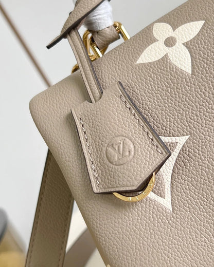 Madeleine MM Bicolor Monogram Empreinte Leather Bag