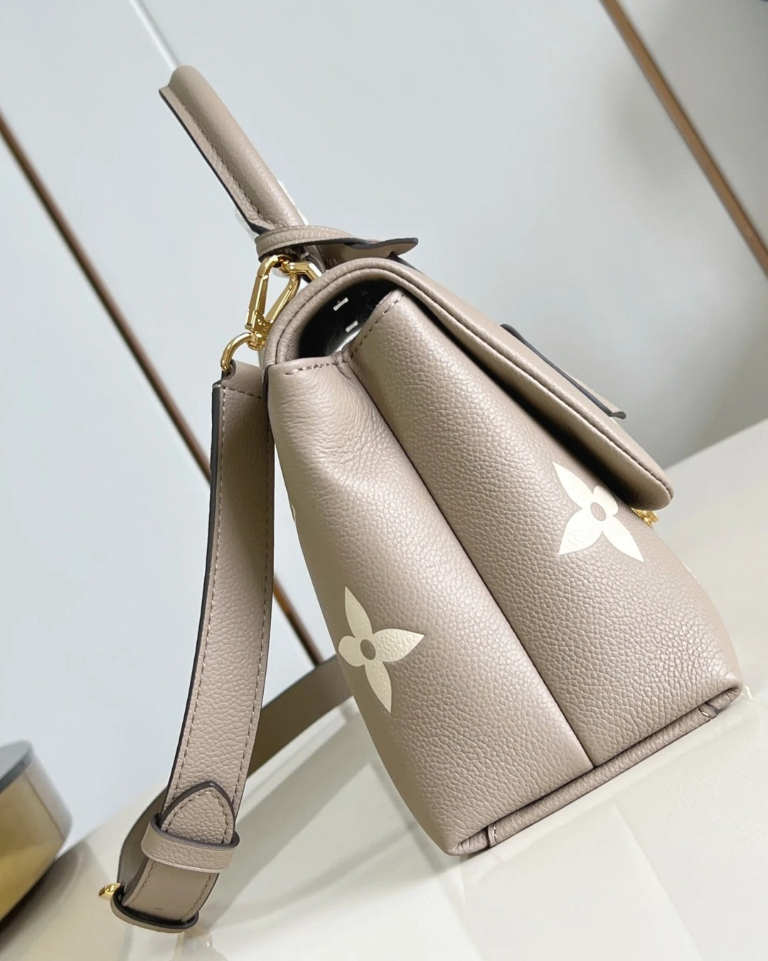 Madeleine MM Bicolor Monogram Empreinte Leather Bag