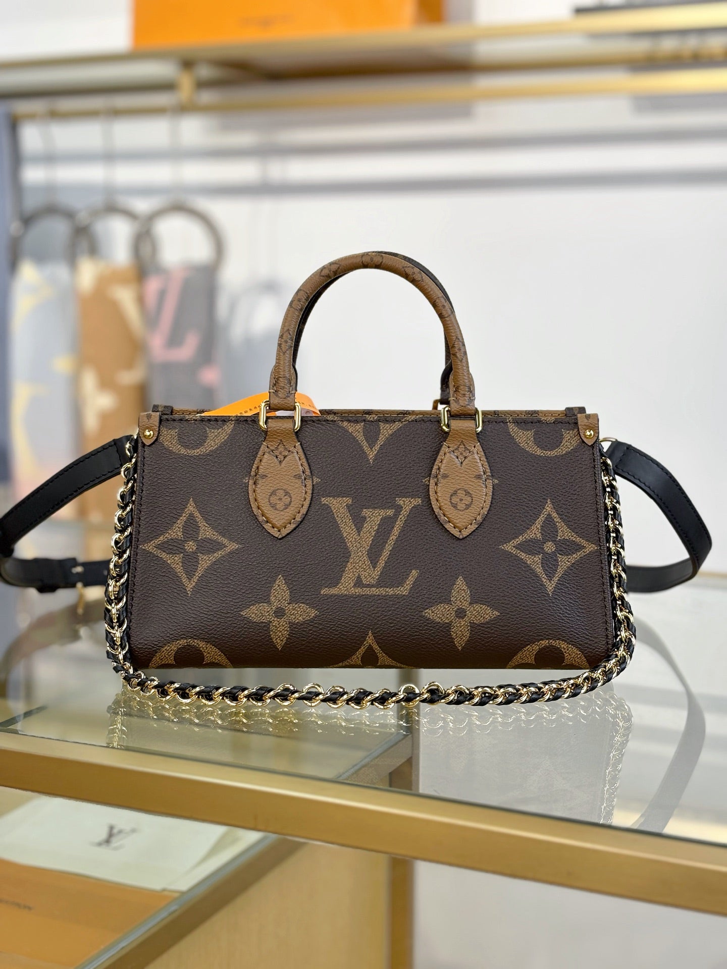 Louis Vuitton OnTheGo East West Chain Monogram Reverse Bag