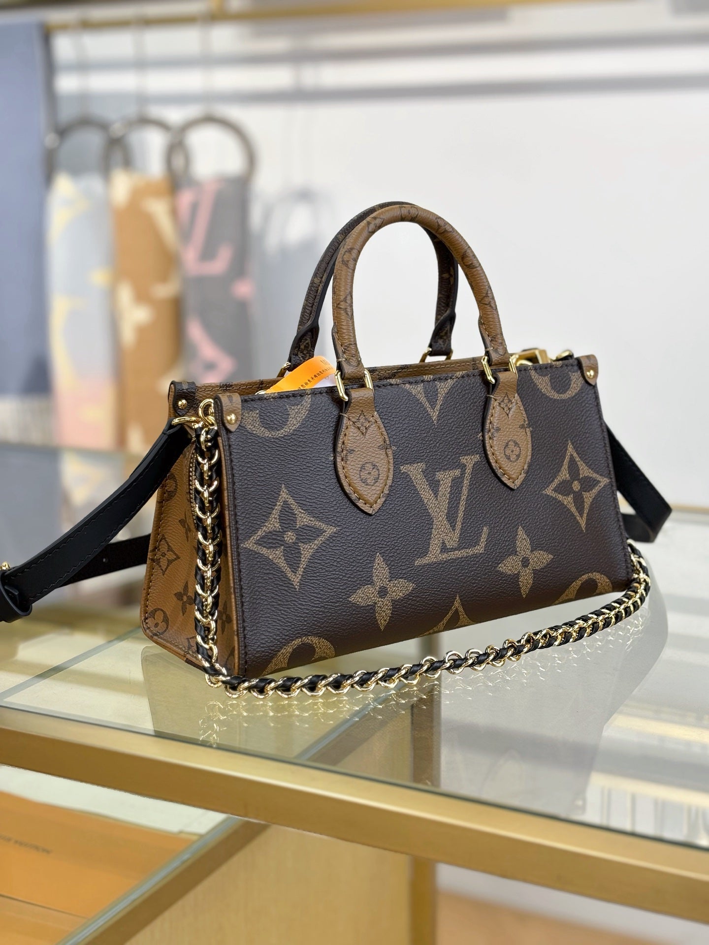 Louis Vuitton OnTheGo East West Chain Monogram Reverse Bag