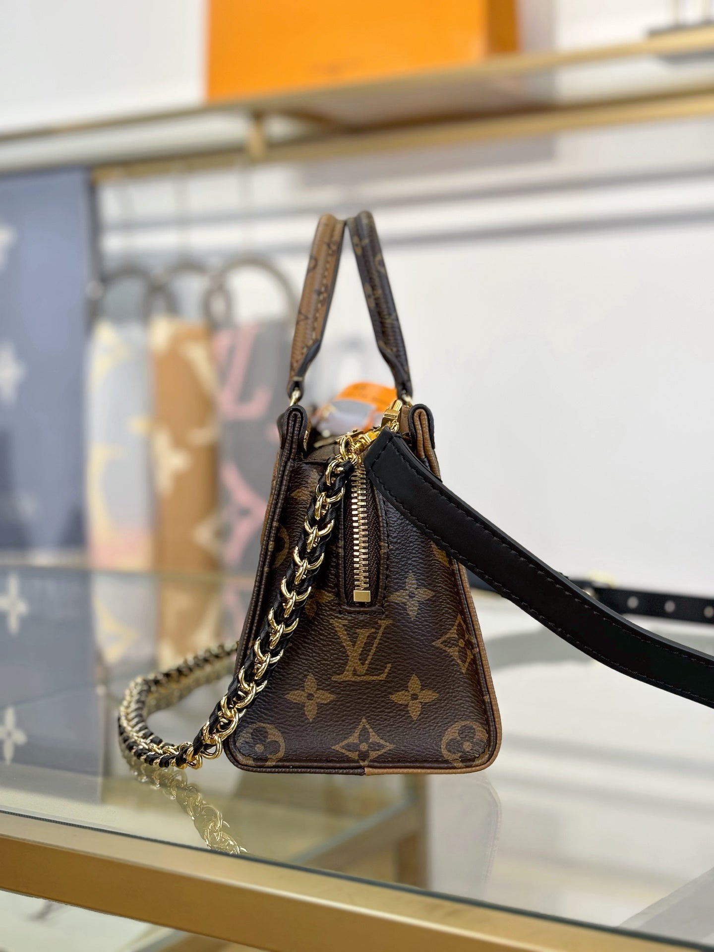 Louis Vuitton OnTheGo East West Chain Monogram Reverse Bag