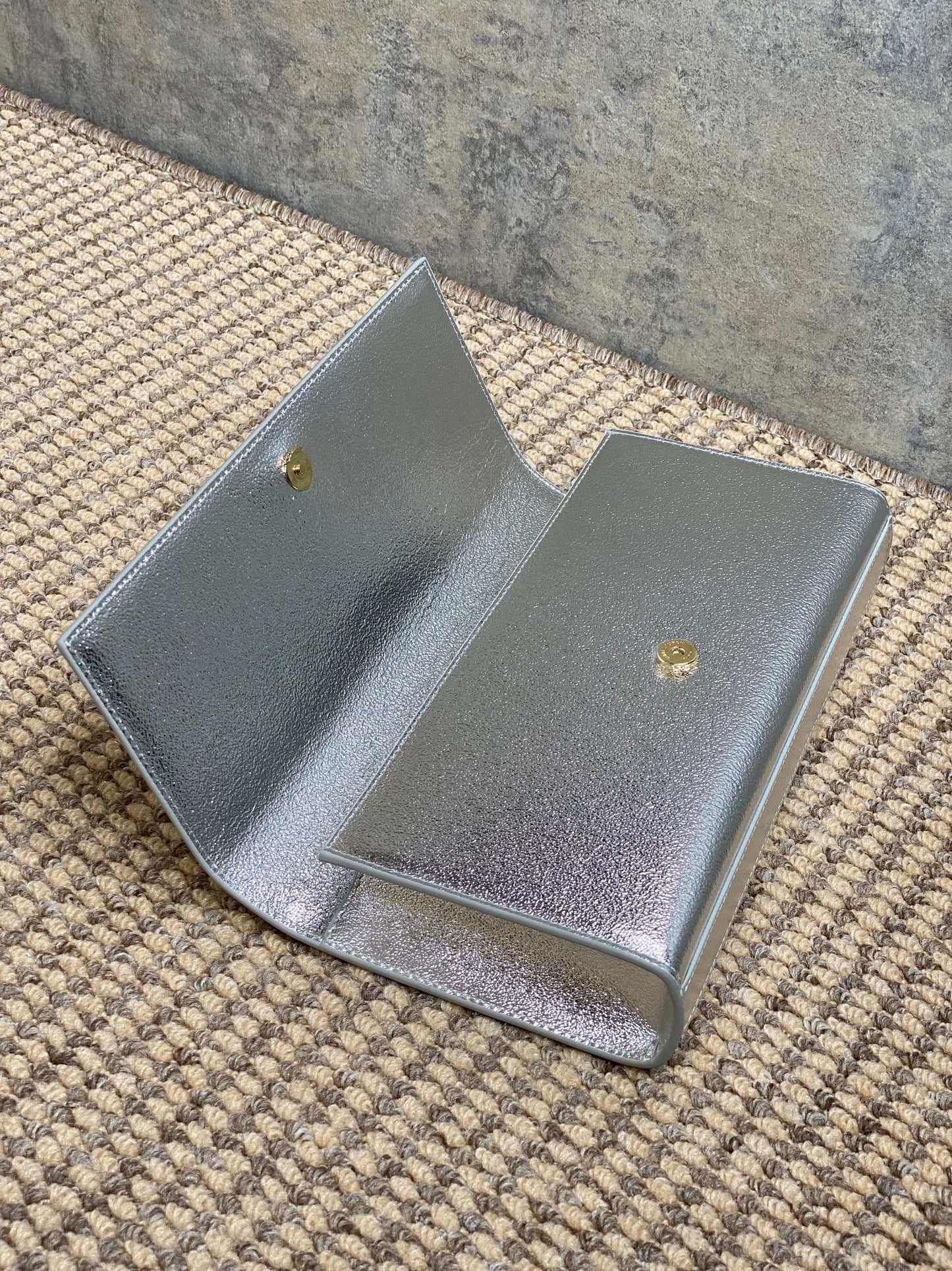 SAINT LAURENT Cassandre Metallic Logo Clutch Bag