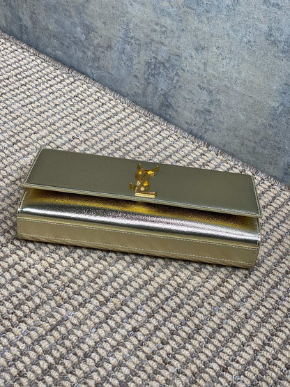 SAINT LAURENT Cassandre Metallic Logo Clutch Bag