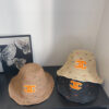 Chanel Woven Straw Bucket Hat with CC Logo