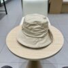 Prada Bucket Hat with Logo Plaque