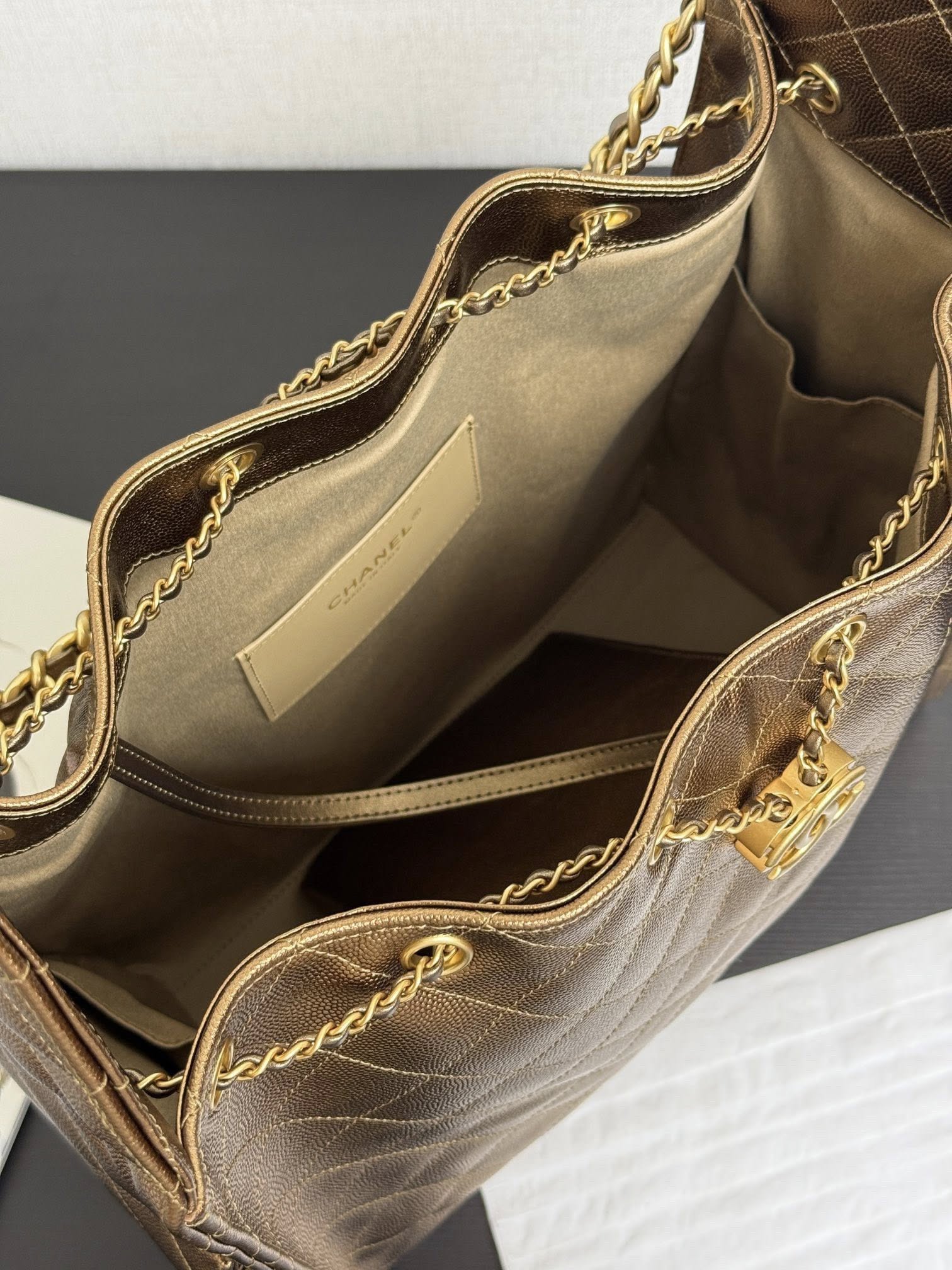 Chanel 25 Hobo Handbag - Bronze Caviar Leather