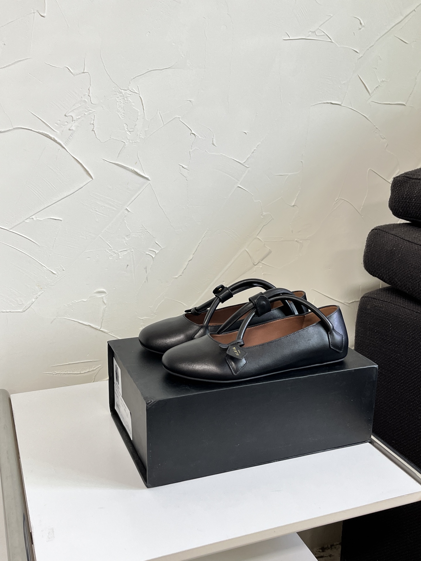 ALAÏA Ballet Flats with Cross-Strap