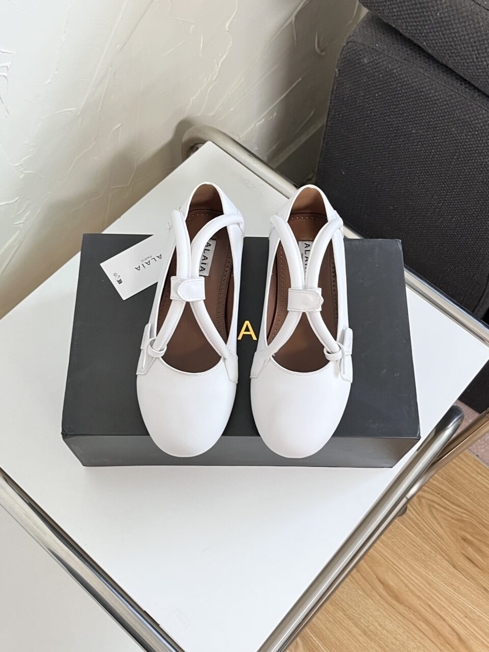 ALAÏA Ballet Flats with Cross-Strap