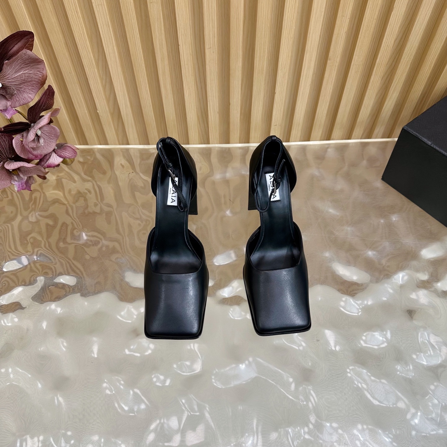 ALAÏA Minimalist Leather Ankle-Strap Block-Heel Pumps