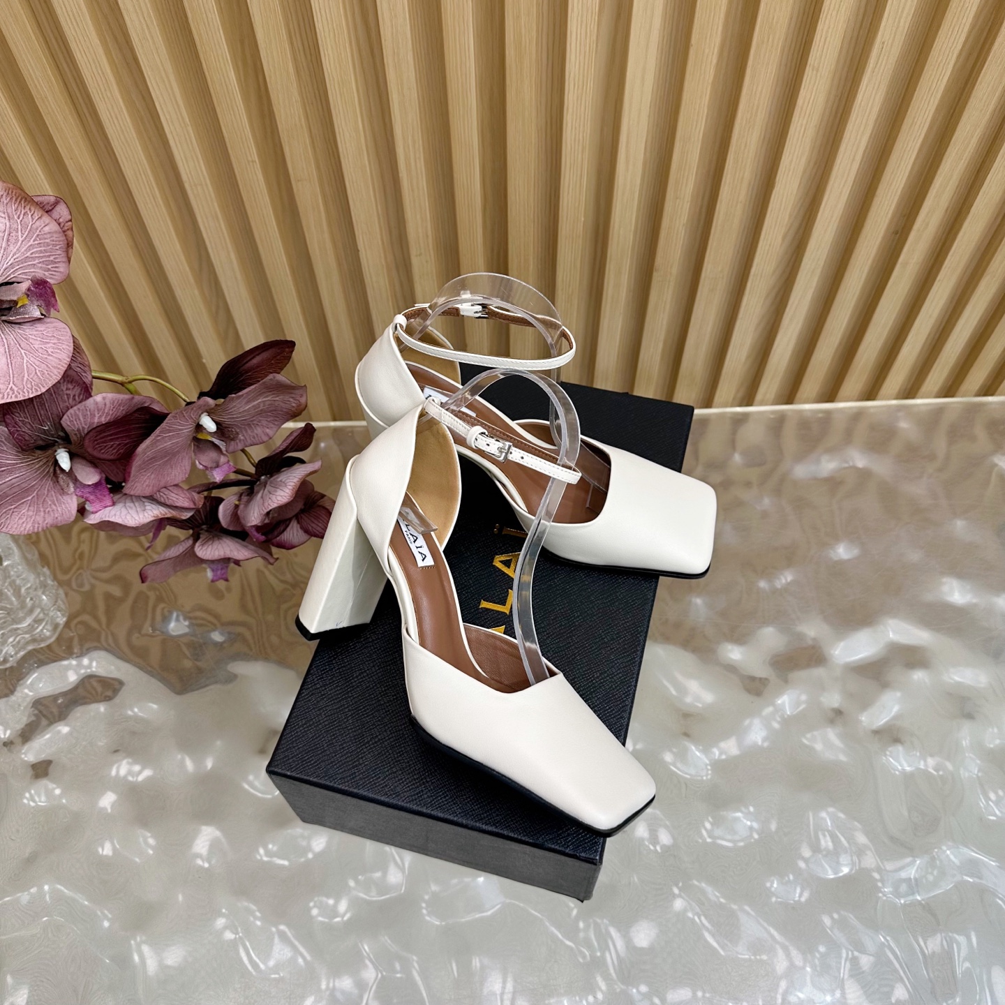 ALAÏA Minimalist Leather Ankle-Strap Block-Heel Pumps