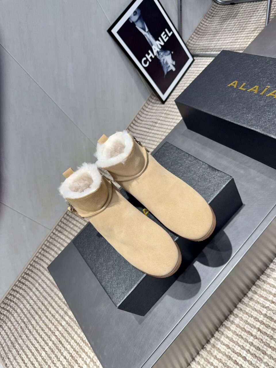 ALAÏA Shearling-Lined Suede Ankle Boots