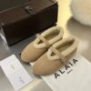 ALAÏA Shearling-Lined Suede Mary Jane Flats