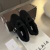 ALAÏA Shearling-Lined Suede Mary Jane Flats