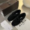 ALAÏA Shearling-Lined Suede Mary Jane Flats