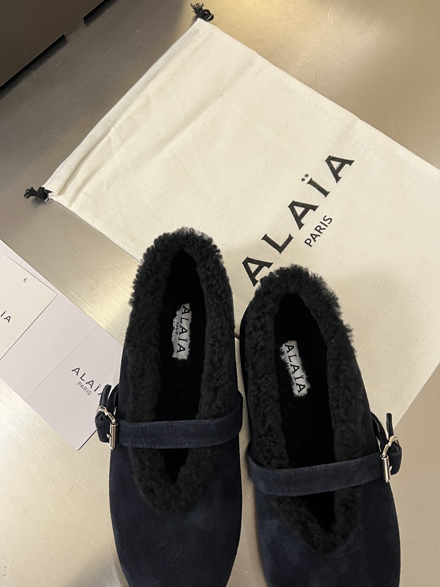 ALAÏA Shearling-Lined Suede Mary Jane Flats