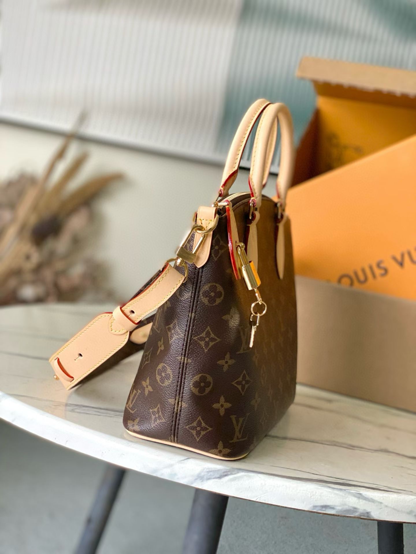 LOUIS VUITTON Neo Lockit PM